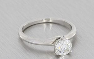 Elegant Three Claw Solitaire With Diamond Set Contoured Band