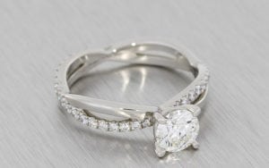 Platinum and diamond crossover engagement ring