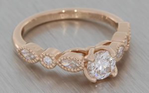 Rose gold with fancy shape diamond and moissanite ring