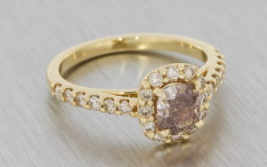 Yellow Gold Ring Set with a Centre Cognac Diamond Surrounded with a Champagne Diamond Halo