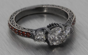 18K Salt and pepper diamond ring set with red garnets
