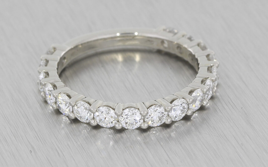 Diamond shared claw eternity band