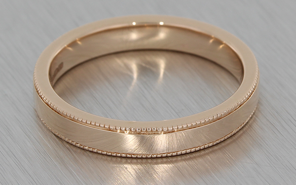 Rose gold wedding band with milgrain detailing