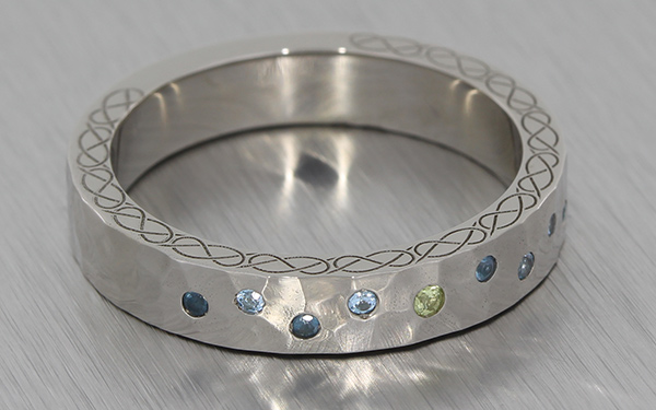 Palladium flush set hammered textured band